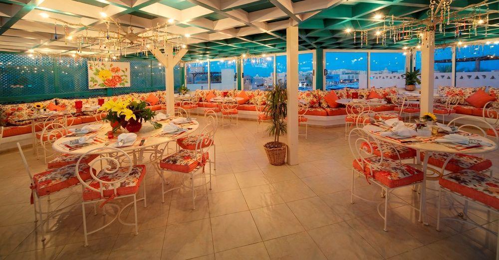 Turtle'S Inn Hotel Хургада Ресторан фото